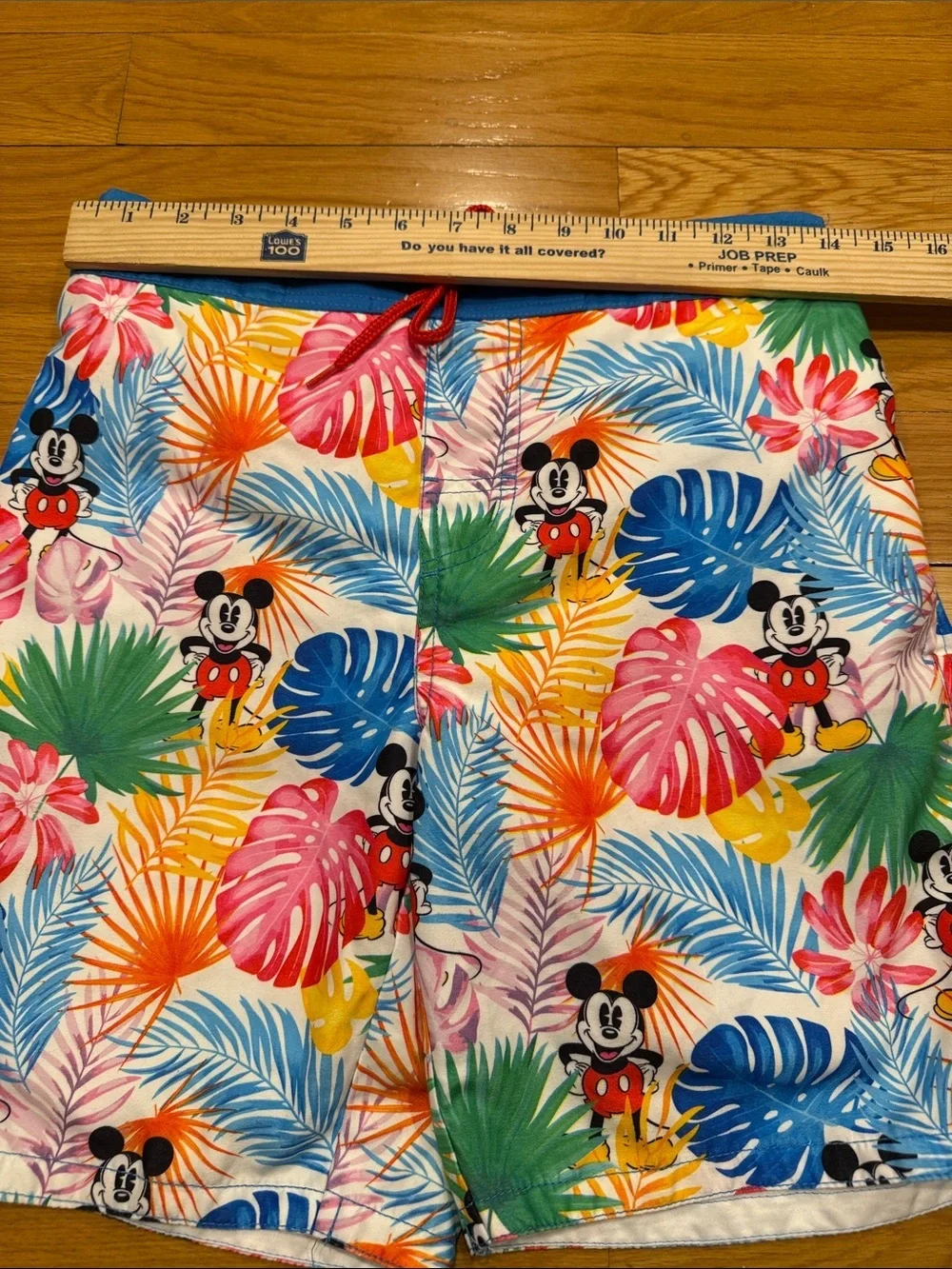Disney store men’s swim shorts size small ,